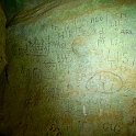 Looking at 18th and 19th century graffiti in Sönghellir ("song cave").