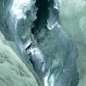 At this point, we're looking up into a crevasse from a wooden bridge built inside the glacier!