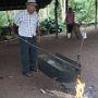 Antonio demonstrating their old coffee roasting method...