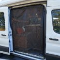 Screen door panel to keep out bugs in the evening and keep out cold without fully closing van