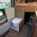 Bench seat hides dry composting toilet