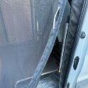 The VanEssential screen door is a little simpler with just a magnetic closure on one edge.